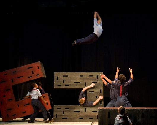 A dancer dives off of a dissembled box in Diavolo's "Fearful Symmetries." No copyright infringement intended. 